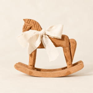 ROVIA wooden rocking horse ornament with white bow on ivory background